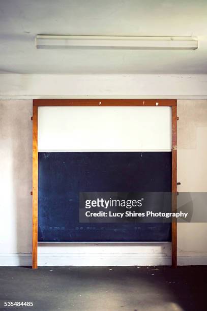 chalk board in lecture hall - lucy shires stockfoto's en -beelden
