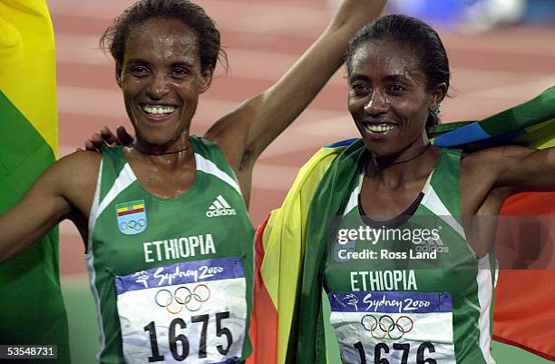 Women's 10,000m winner Derartu Tulu of Ethiopia and Gete Wami . Tulu won in a time of 30min17.49sec at the Olympic Games, Saturday.