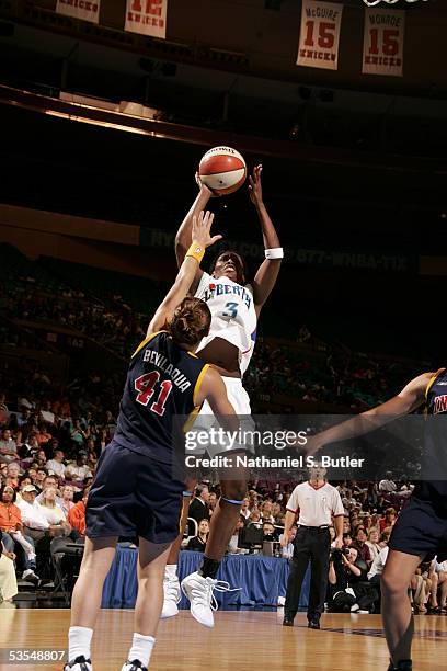 Crystal Robinson of the New York Liberty shoots against Tully Bevilaqua of the Indiana Fever in Game One of the Eastern Conference Semis during the...