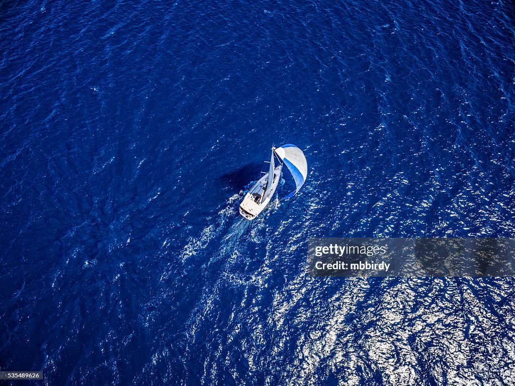 Sailing with sailboat, view from drone