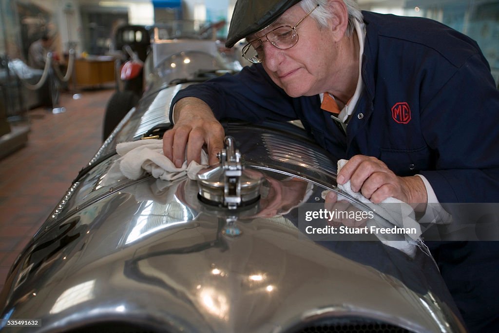 UK - Weybridge - Mechanic Dave Nicholls cleans a Napier Railton