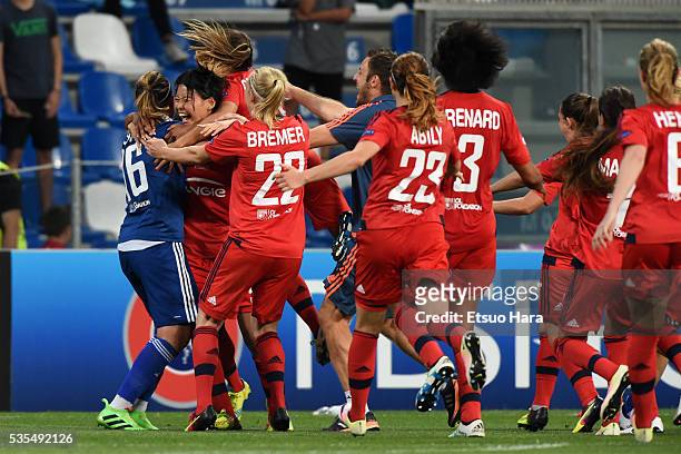 Saki Kumagai and Lyonnais players celebrate their win through the penalty shootout in the UEFA Women's Champions League Final between VfL Wolfsburg...