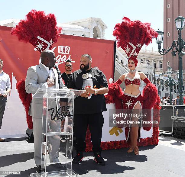 Councilman Ricki Barlow, DJ Khaled, Las Vegas showgirls Jennifer Aurty and Porsha Revesz during the ceremony presenting DJ Khaled a key to the Las...