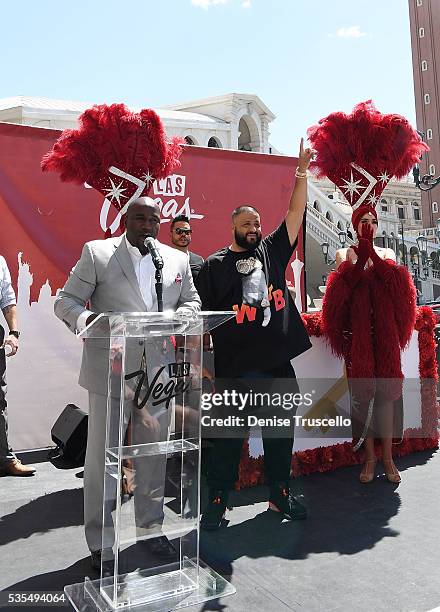 Councilman Ricki Barlow, DJ Khaled, Las Vegas showgirls Jennifer Aurty and Porsha Revesz during the ceremony presenting DJ Khaled a key to the Las...