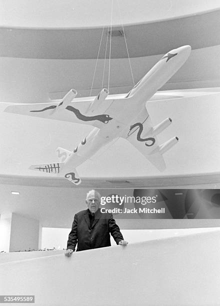 Artist Alexander Calder and his painted jet airplane models at the Guggenheim Museum in August 1973.