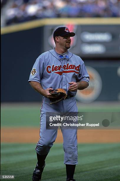 Cleveland Indians first baseman Jim Thome smiles with his glove in his hand during the American League Division Series game against the Seattle...
