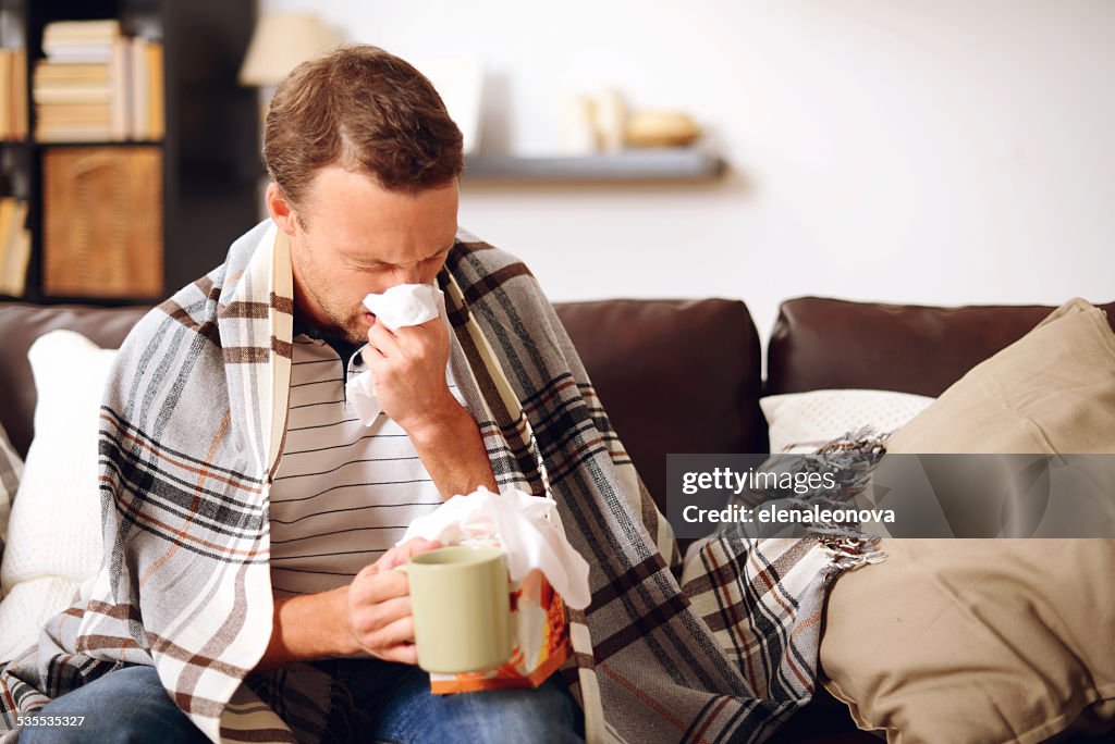 Young man in home interior