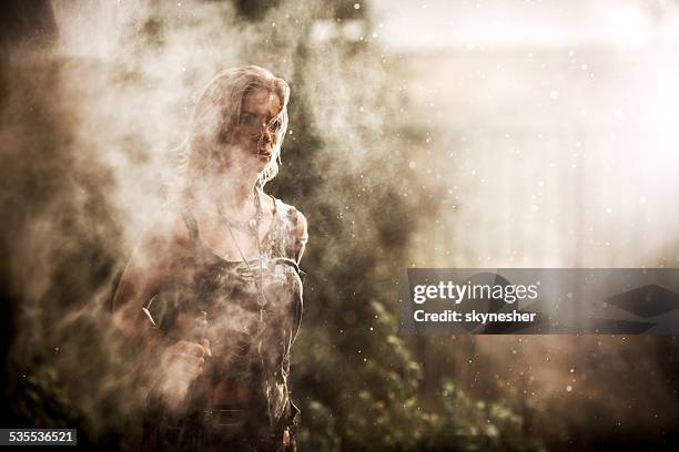 warrior woman at rain. - amazon warriors stock pictures, royalty-free photos & images