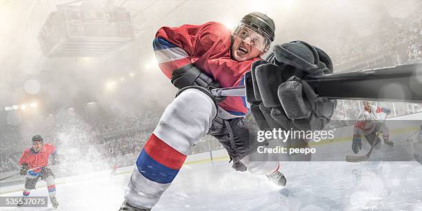 ice hockey action in extreme close up - hockey crowd stock pictures, royalty-free photos & images