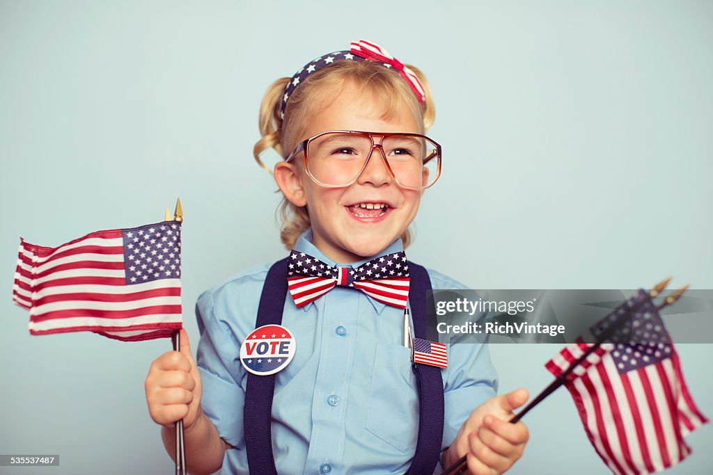 Young American Girl with American Flags