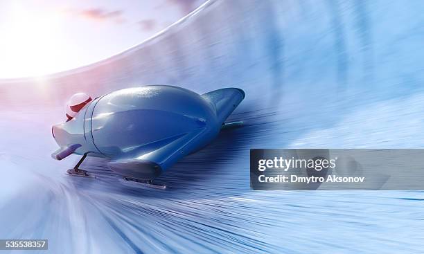 bobsleigh team - course de skeleton stockfoto's en -beelden