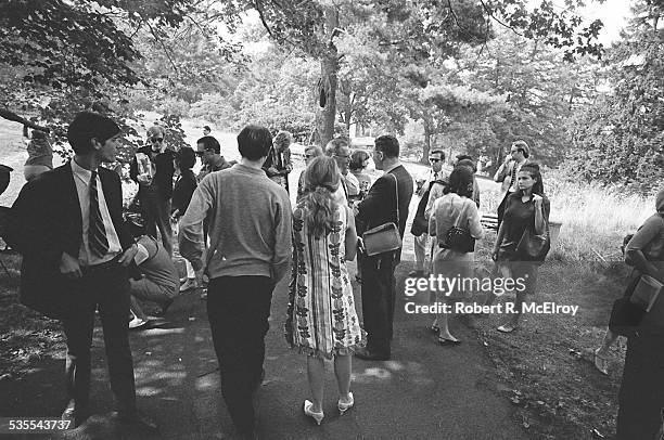 During a visit to Stan Vanderbeek's studio and 'Movie Drome' theatre as part of the New York Film Festival, attendees talk amongst themselves, Stony...