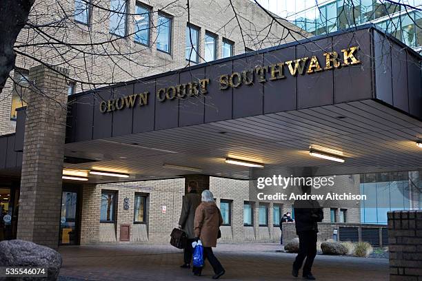 Members of the public arriving at Southwark Crown Court. Opened in 1983, the building contains 15 courtrooms, making it the fourth largest court...