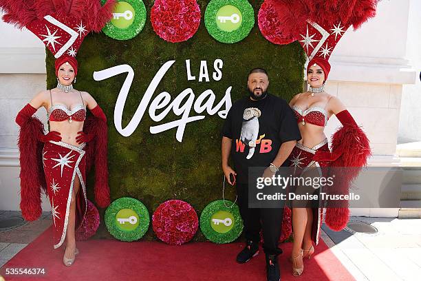 Las Vegas showgirls Jennifer Aurty , Porsha Revesz and DJ Khaled attend ceremony presenting DJ Khaled a key to the Las Vegas strip and the launch of...