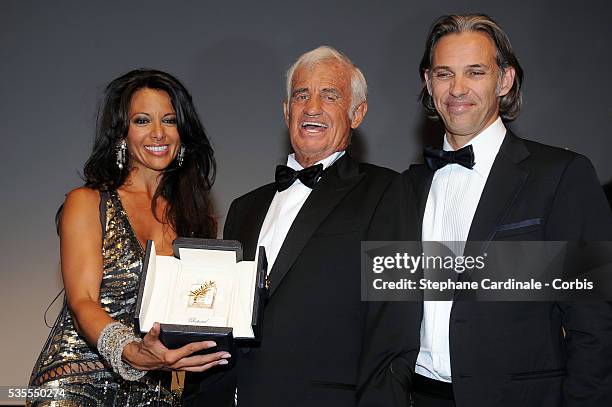 Barbara Gandolfi, Jean-Paul Belmondo and Paul Belmondo attend the "Tribute to Jean-Paul Belmondo" during the 64th Cannes International Film Festival.