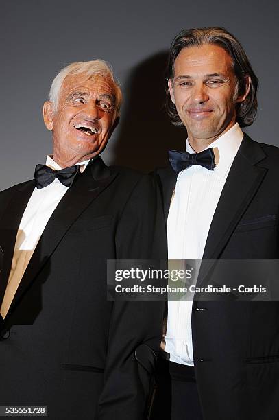 Jean-Paul Belmondo with his son Paul Belmondo during the "Tribute to Jean-Paul Belmondo" at the 64th Cannes International Film Festival.