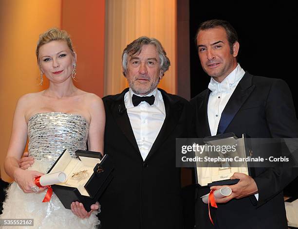 Kirsten Dunst, Robert De Niro and Jean Durjardin at the Closing Ceremony during the 64th Cannes International Film Festival