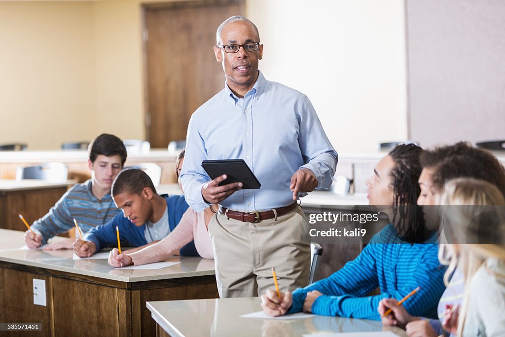 Teacher with students in classroom
