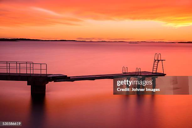 jetty at sunset - göteborg silhouette bildbanksfoton och bilder