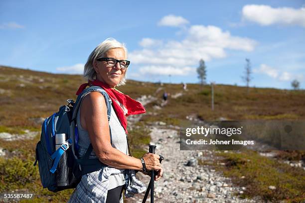 senior woman hiking - backpacker woman bildbanksfoton och bilder