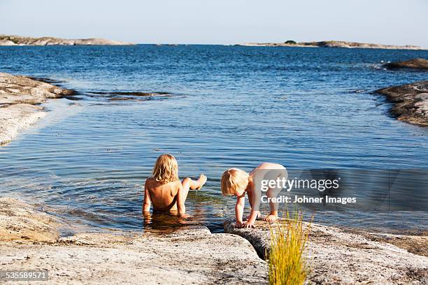 children at sea - stockholm beach stock pictures, royalty-free photos & images