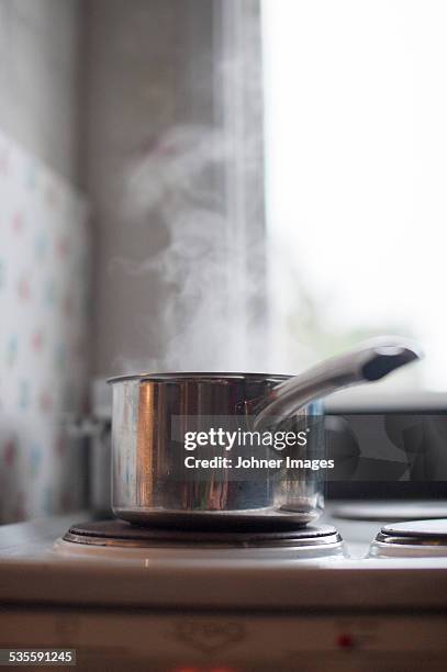 saucepan on cooker - boiling stock pictures, royalty-free photos & images