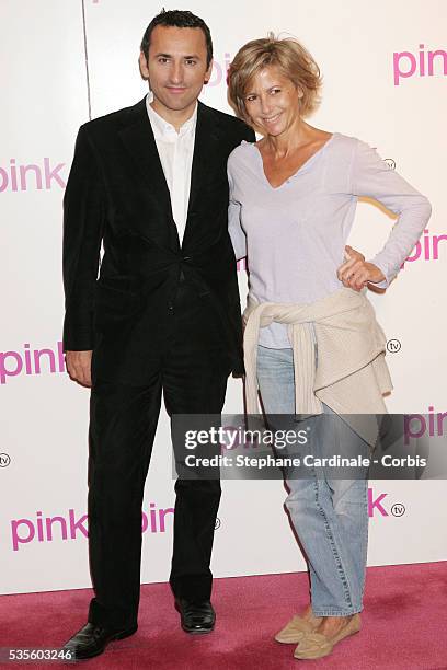 Movie Producer and Pink TV President Pascal Houzelot with TV host Claire Chazal.