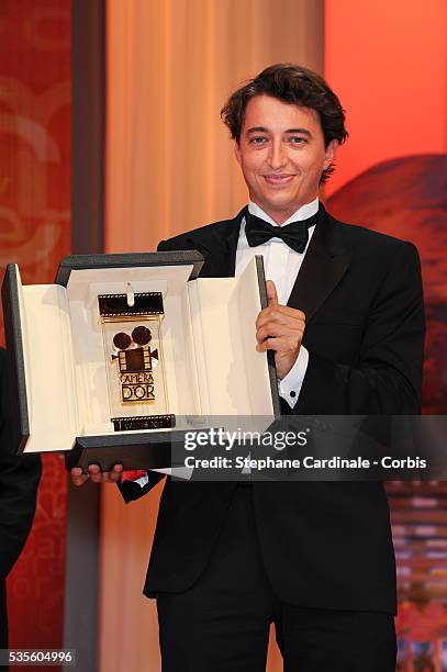 Director Benh Zeitlin holds the Camera d'Or for 'Beasts Of The Southern Wild' onstage at the Closing Ceremony during the 65th Annual Cannes Film...
