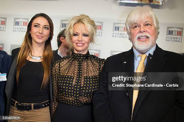 Former miss France Delphine Wespiser, US actress Pamela Anderson and environmental activist Paul Watson give a press conference after attending a...