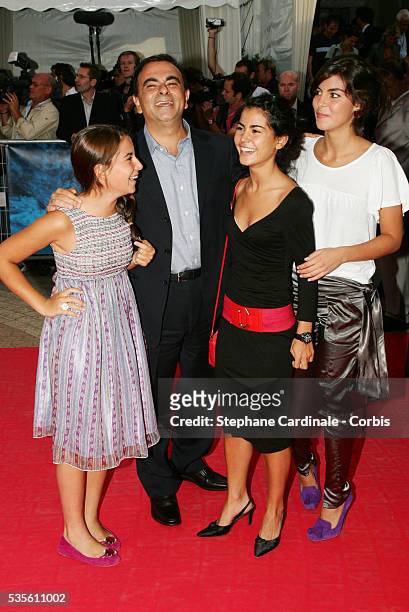 French businessman Carlos Ghosn with his daughters, Maya, Nadine, Caroline at the premiere of "Devil Wears Prada" during the 32nd American Film...
