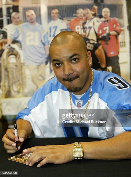 Musician Francisco Gomez of AWKID signs copies of their new album, "Los Aguacates de Jiquilpan" at Best Buy on August 30, 2005 in Los Angeles,...
