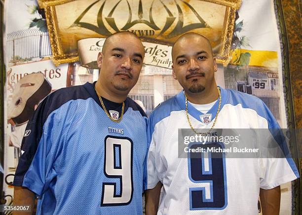 Musicians Sergio Gomez and Francisco Gomez of AWKID sign copies of their new album, "Los Aguacates de Jiquilpan" at Best Buy on August 30, 2005 in...