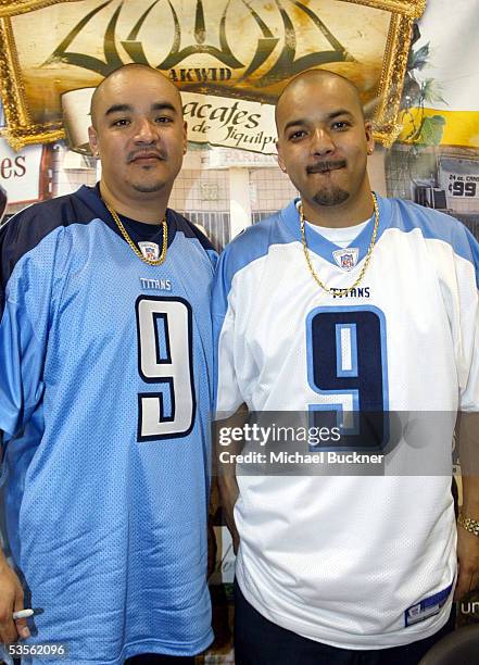 Musicians Sergio Gomez and Francisco Gomez of AWKID sign copies of their new album, "Los Aguacates de Jiquilpan" at Best Buy on August 30, 2005 in...