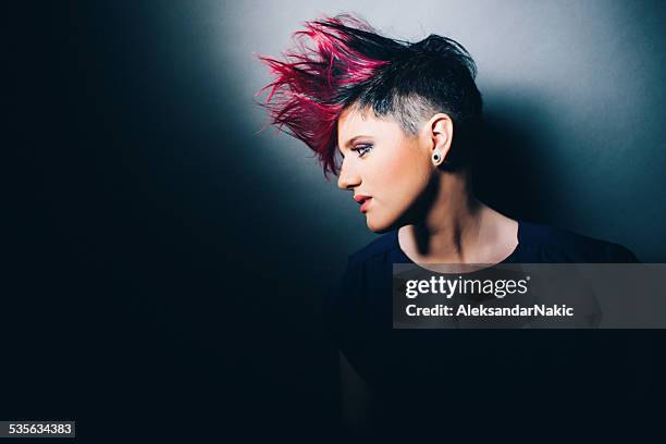 fire hair - punkt stock pictures, royalty-free photos & images