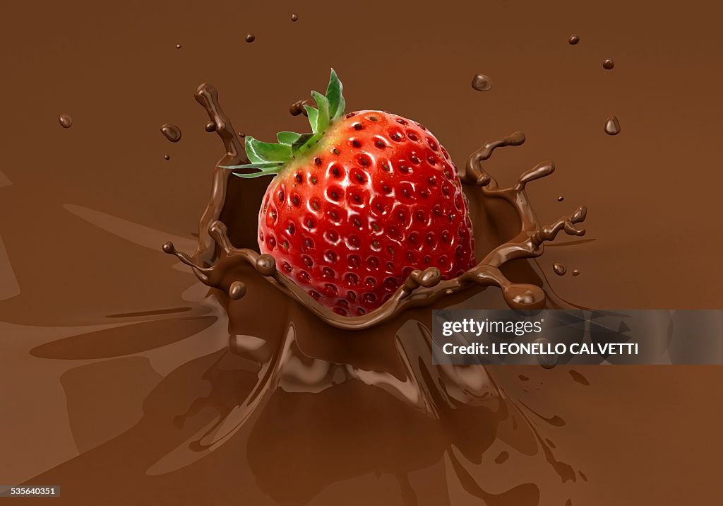 Strawberry splashing into milkshake