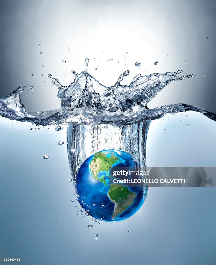 Planet earth splashing into water