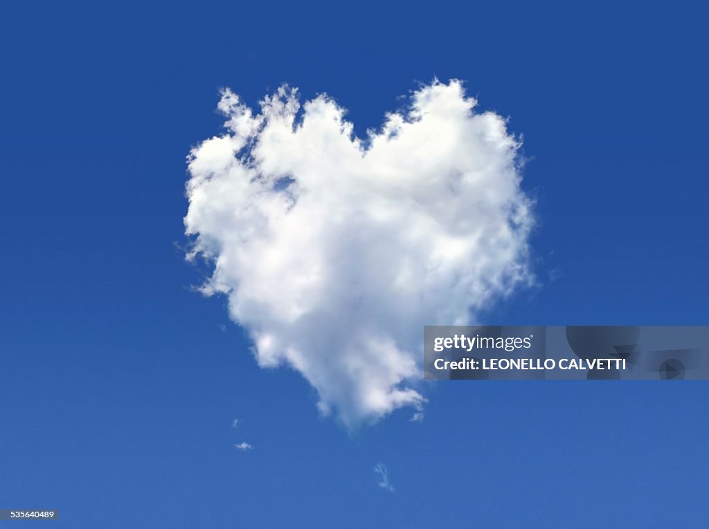 Heart shaped cloud against a blue sky