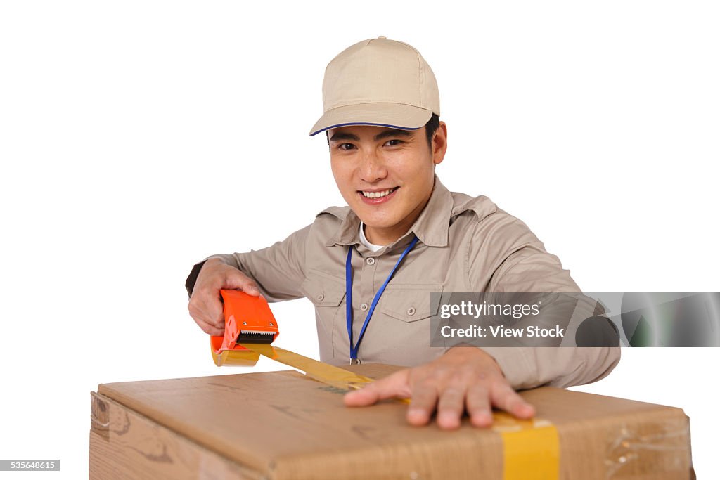 Young man with box