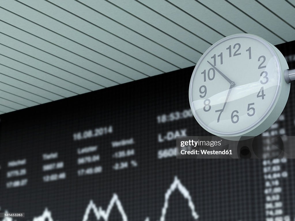 Germany, Stock exchange trading and clock in the foreground