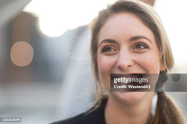 portrait of smiling businesswoman - smiling eyes stock-fotos und bilder