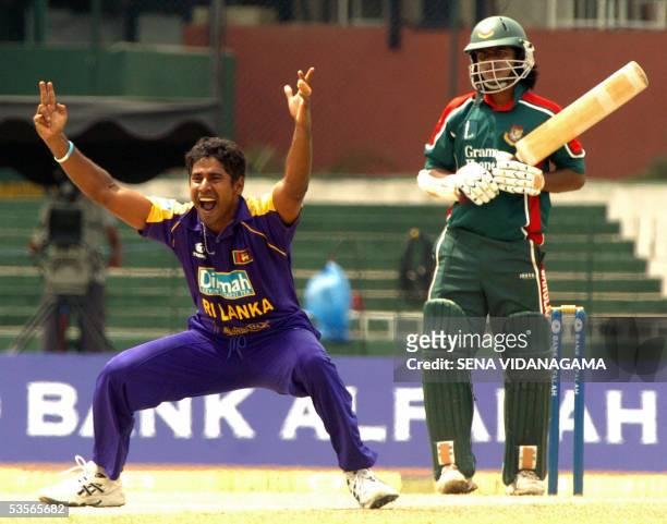 Sri Lankan bowler Chaminda Vaas appeals unsuccessfully for the wicket of Bangladesh batsman Javed Omer during the One Day International cricket match...