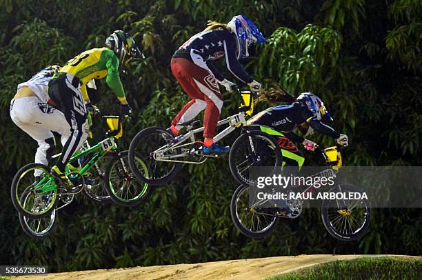 Cyclists compete during the UCI BMX World Championships Elite Women's Moto Race on May 29, 2016 in Medellin, Antioquia department, Colombia. / AFP /...