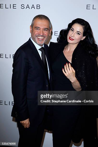 Elie Saab and Dita Von Teese attend Elie Saab Spring/Summer 2013 Haute-Couture show as part of Paris Fashion Week at Pavillon Cambon, in Paris.