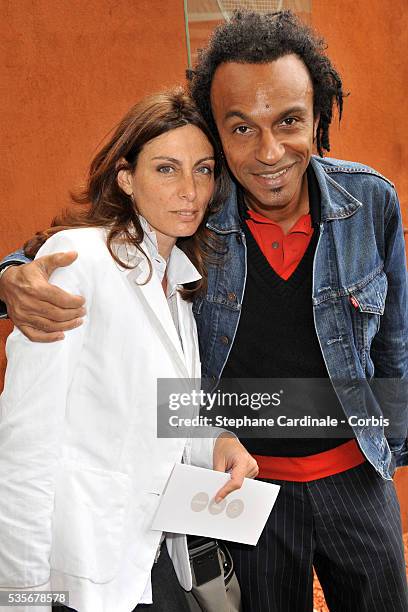 Manu Katche and his wife Laurence at Roland Garros Village in Paris.