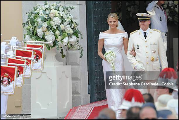 Princess Charlene of Monaco and Prince Albert II of Monaco leave the religious ceremony of the Wedding at the Prince's Palace, in Monaco.