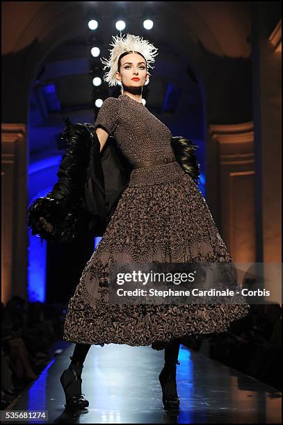 Model walks the runway at the Jean Paul Gaultier Haute Couture show, as part of the Paris Fashion Week Fall/Winter 2011/2012 in Paris.