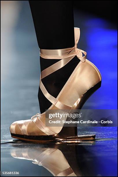 Model walks the runway at the Jean Paul Gaultier Haute Couture show, as part of the Paris Fashion Week Fall/Winter 2011/2012 in Paris.