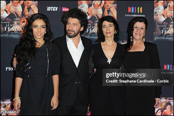 Hafsia Herzi, Radu Mihaileanu, Hiam Abbass and Biyouna attend "La Source Des Femmes" Premiere at Theatre du Chatelet, in Paris.