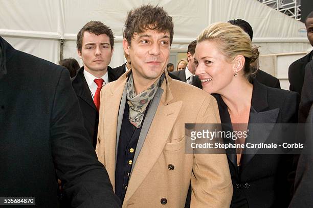 Jamie Hince and Kate Moss attend the Chanel Ready-to-Wear Autumn/Winter 2009/2010 fashion show during Paris Fashion Week at the Grand Palais in Paris.