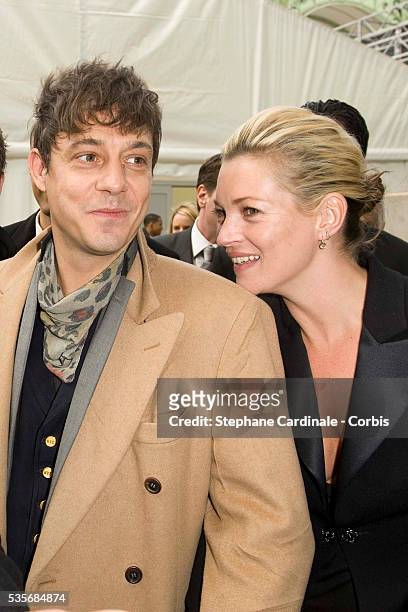 Jamie Hince and Kate Moss attend the Chanel Ready-to-Wear Autumn/Winter 2009/2010 fashion show during Paris Fashion Week at the Grand Palais in Paris.